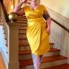 What's New, Pussycat? Ava Faux Wrap Wiggle Dress In Golden Mustard Satin | Pinup Couture 1 What's New, Pussycat? Ava Faux Wrap Wiggle Dress In Golden Mustard Satin | Pinup Couture