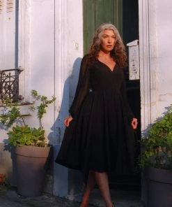 Pinupgirlclothing.com Kara Swing Dress In Black Crepe And Chiffon Sleeves | Laura Byrnes Design What's New, Pussycat? 35 Pinupgirlclothing.com Kara Swing Dress In Black Crepe And Chiffon Sleeves | Laura Byrnes Design What's New, Pussycat?