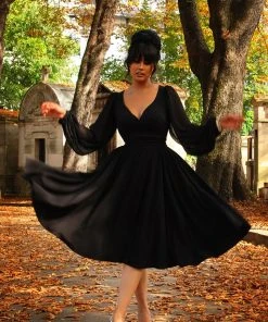 Pinupgirlclothing.com Kara Swing Dress In Black Crepe And Chiffon Sleeves | Laura Byrnes Design What's New, Pussycat? 21 Pinupgirlclothing.com Kara Swing Dress In Black Crepe And Chiffon Sleeves | Laura Byrnes Design What's New, Pussycat?