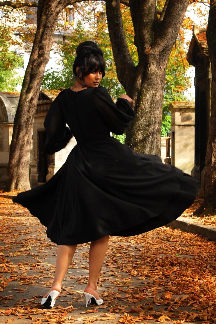 Pinupgirlclothing.com Kara Swing Dress In Black Crepe And Chiffon Sleeves | Laura Byrnes Design What's New, Pussycat? 7 Pinupgirlclothing.com Kara Swing Dress In Black Crepe And Chiffon Sleeves | Laura Byrnes Design What's New, Pussycat?