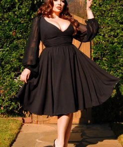 Pinupgirlclothing.com Kara Swing Dress In Black Crepe And Chiffon Sleeves | Laura Byrnes Design What's New, Pussycat?