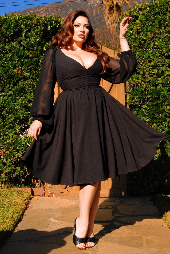 Pinupgirlclothing.com Kara Swing Dress In Black Crepe And Chiffon Sleeves | Laura Byrnes Design What's New, Pussycat? 3 Pinupgirlclothing.com Kara Swing Dress In Black Crepe And Chiffon Sleeves | Laura Byrnes Design What's New, Pussycat?