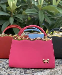 Xinxiang Dixini E-Commerce Co., Ltd. Cupid's Bow 50s Style Purse In Hot Pink Faux Leather