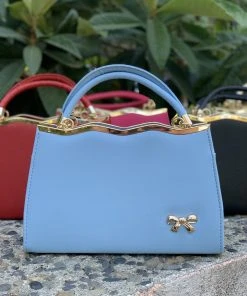 Xinxiang Dixini E-Commerce Co., Ltd. What's New, Pussycat? Cupid's Bow Midcentury Vintage Bag Purse In Baby Blue Faux Leather