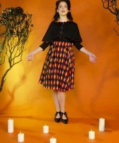 Shop All In-Stock Items By Size OYS Magically Made For Couture For Every Body Celestina Reversible Capelet In Black And Red House Harlequin